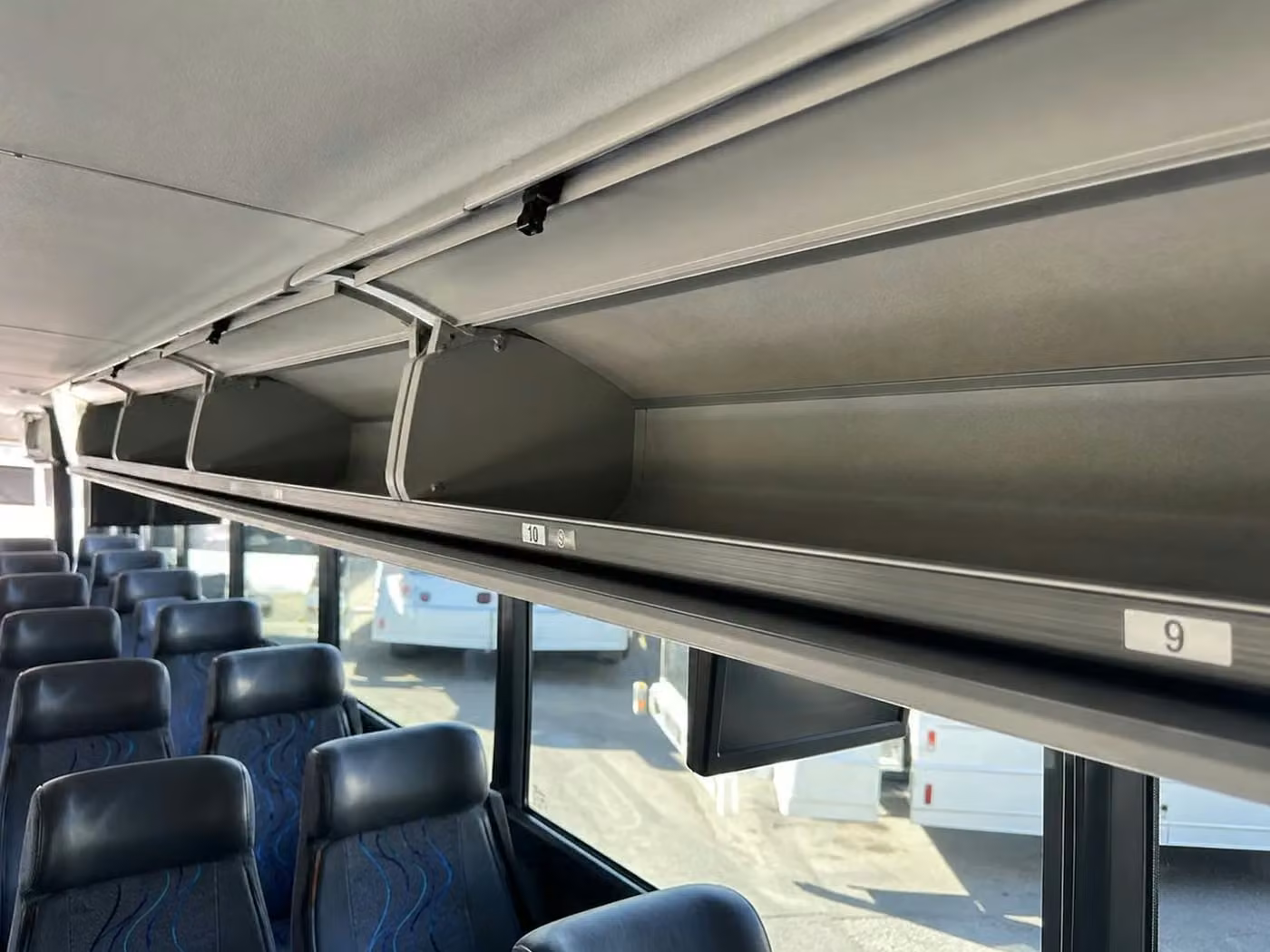 carmel 28 passenger minibus overhead storage
