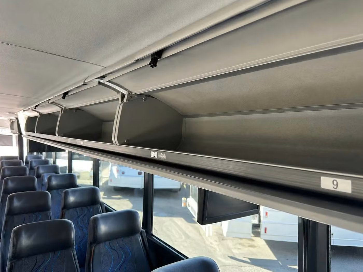 carmel charter bus overhead storage
